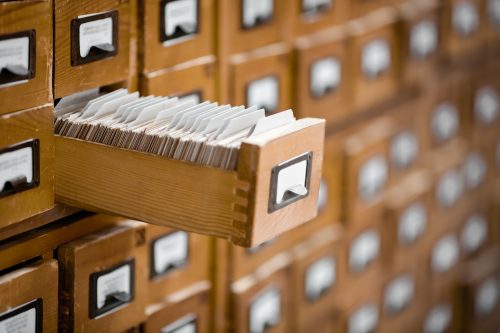 A card catalog with one drawer pulled out