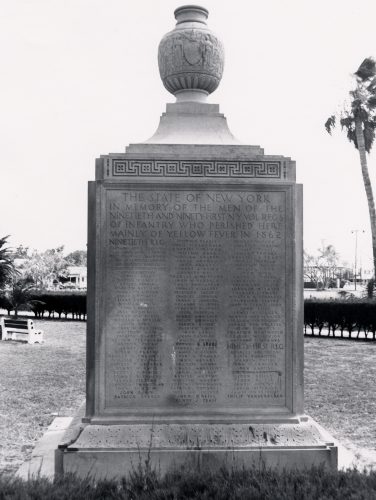 A square memorial with an urn on top with engraving of The State of New York in memory of the men of the ninetieth and ninety first NY vol. Reg's of infantry who perished here mainly of yello fever in 1862. and list of names.