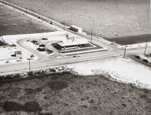 Aerial view of a building at an intersection.